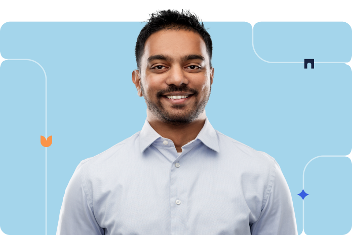 A professional businessperson in a button up shirt smiles in a portrait against a branded blue background